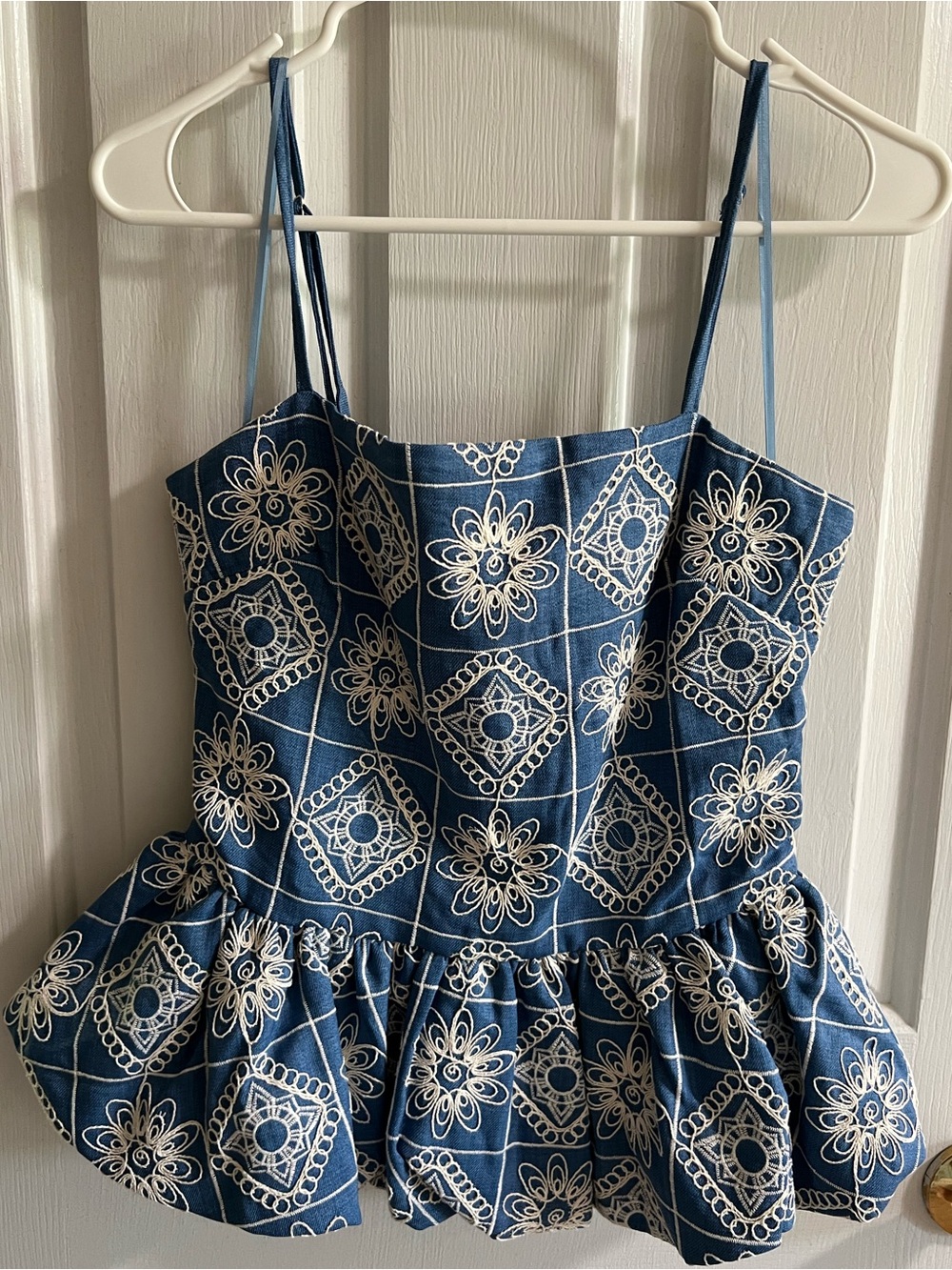 Camellia Embroidered Peplum Bubble Hem Top